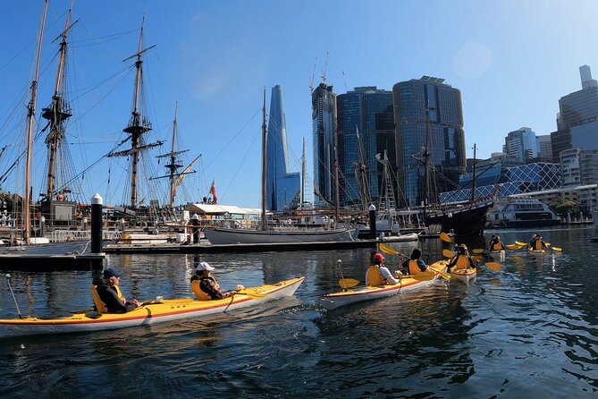 Darling Harbour Explorer - Sea Kayaking Tour - Passing the HMB Endeavour and James Craig: the time-machine feeling