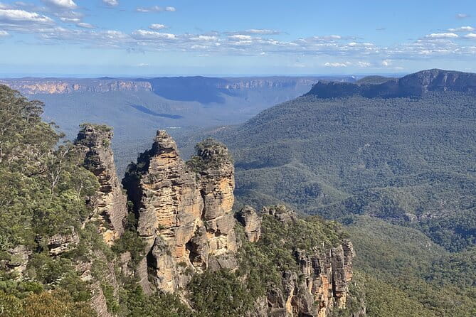 Fully Inclusive Blue Mountains Private Tour inc Scenic World & Featherdale Entry - Echo Point, the Three Sisters, and deciding on the Giant Stairway