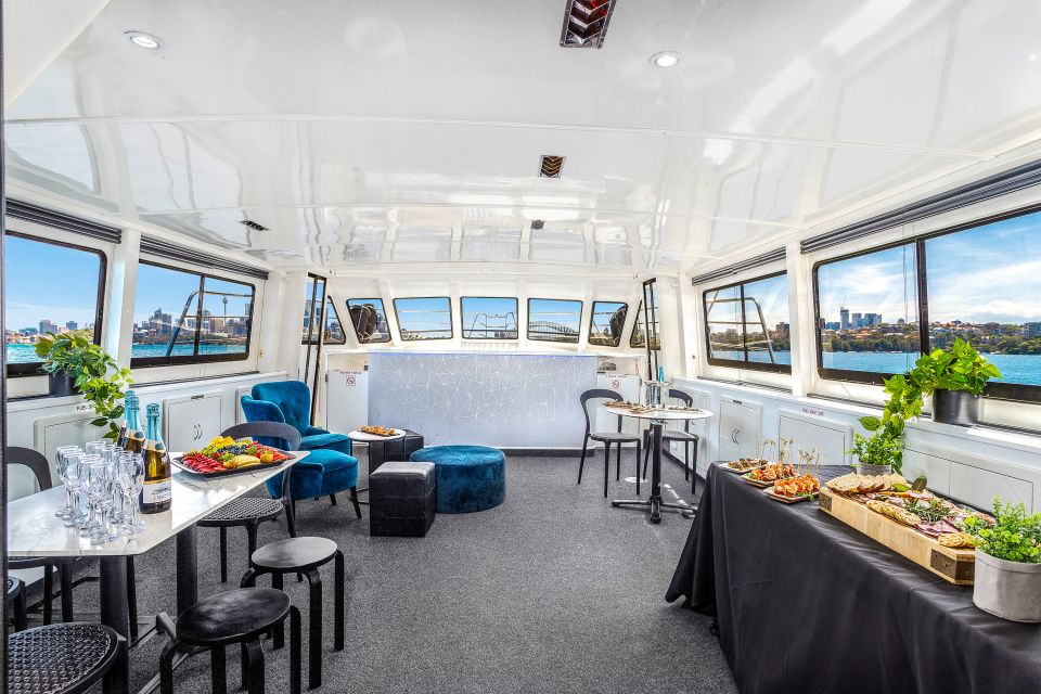 Sydney: Vivid Harbour Cruise with Canapes - Boarding on a Catamaran: Indoors, Outdoors, and Photo Angles