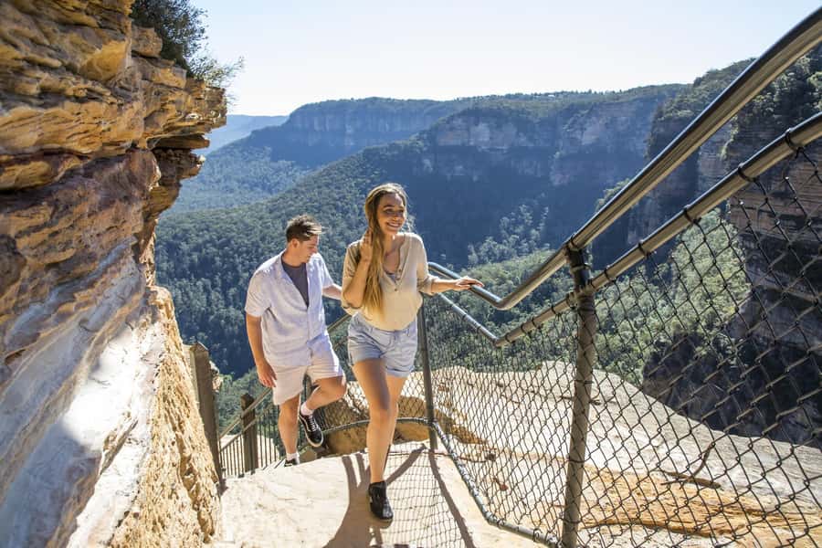 Sydney: Waterfall Bushwalk and Blue Mountain Sunset Day Trip - Three Sisters at Golden Hour: Sacred Rocks and Good Photo Timing